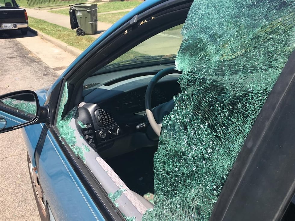 Van with broken window (Source: NBC12)