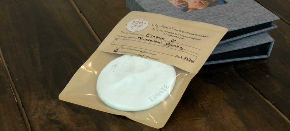 A print of Emmie's paw was given to Perry's Steakhouse as a token of appreciation.