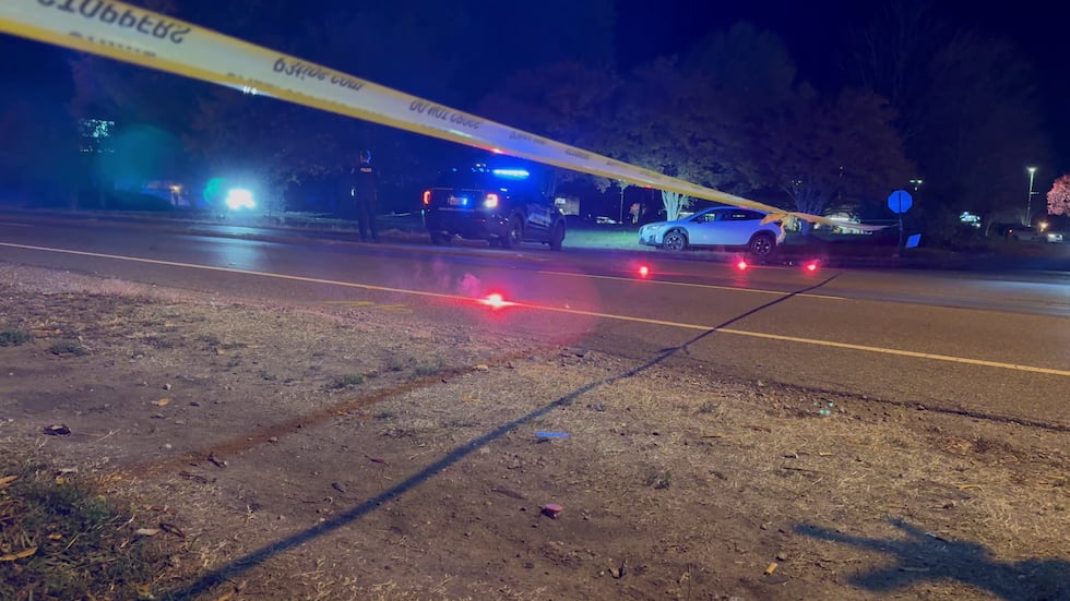 Police block off Hull Street Road after a crash on Thursday.