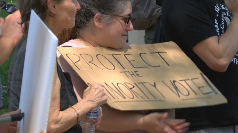 Protesters marching in response to SCOTUS voting rights decision.