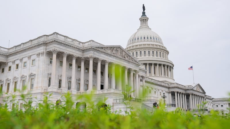 The US Capitol is photographed after a news conference, Tuesday, Sept. 30, 2025, at the...