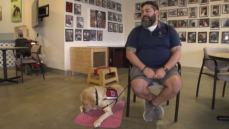 Joel Silva with Spirit, who was trained at Service Dogs of Virginia