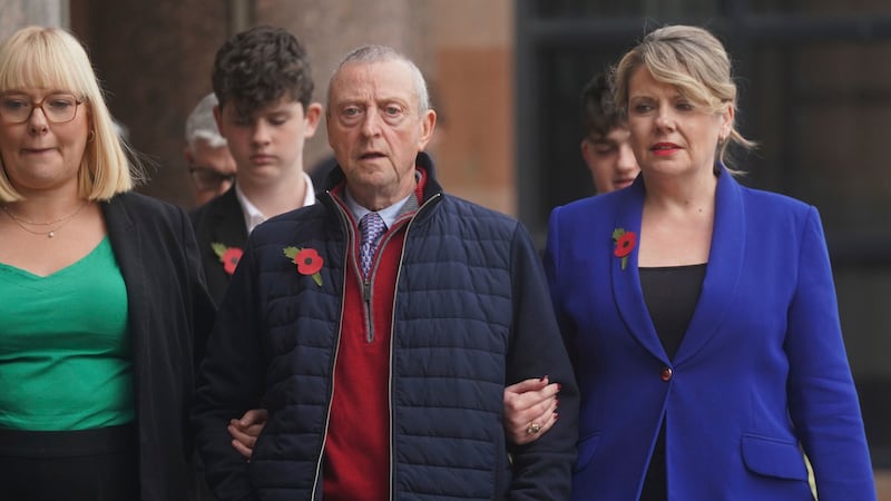 Patrick O'Hara, center, and family members leave Newcastle Crown Court, in Newcastle, England,...
