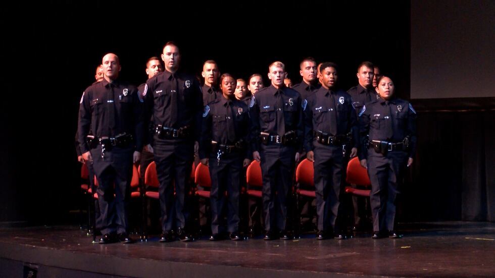 Chip Gray Rpd From family pinnings to a proposal, 19 RPD officers graduate academy
