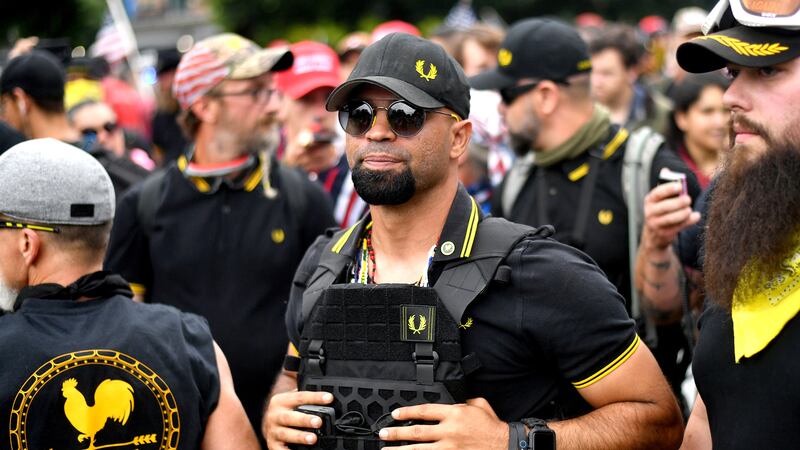 FILE - Proud Boys chairman Enrique Tarrio rallies in Portland, Ore. Outside pressures and...