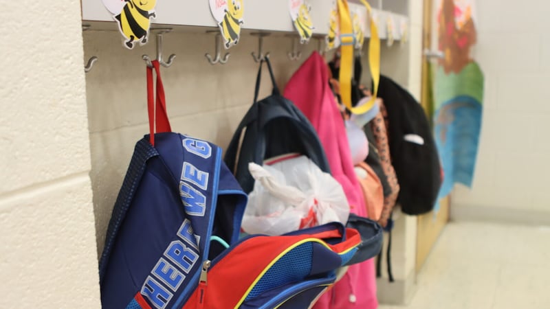 A row of backpacks at a Virginia school.