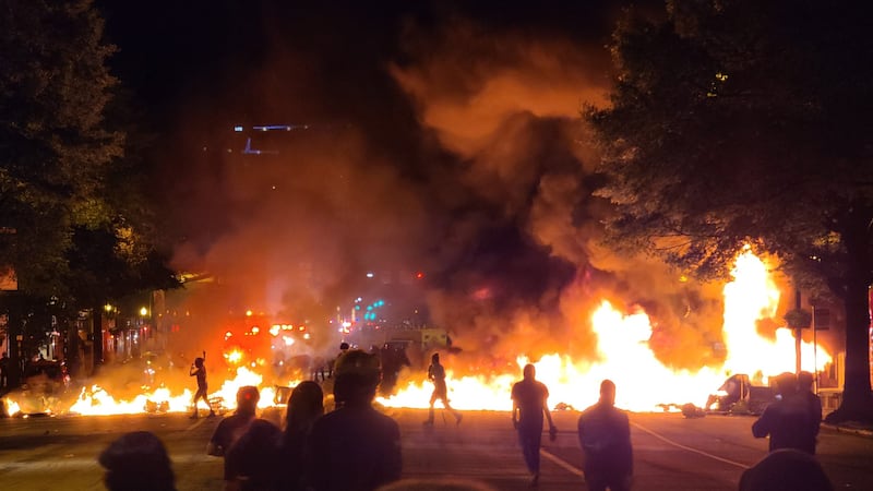 At least one person was shot as violent protests over the death of George Floyd erupted for a...