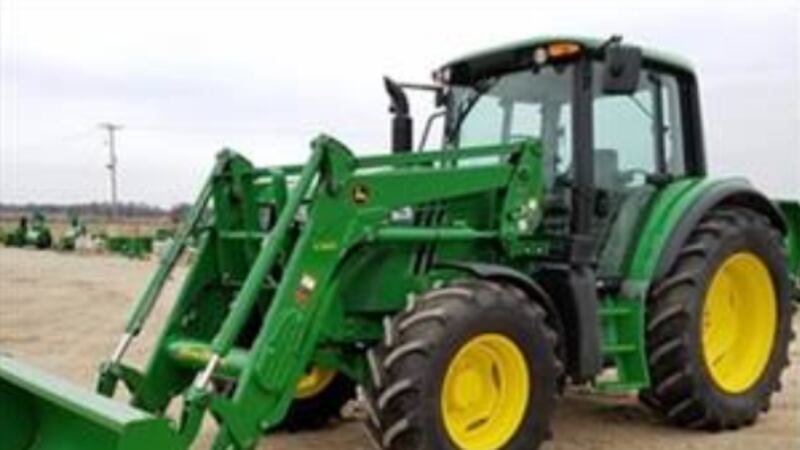 Stock Photo of John Deere 6125M Tractor with H340 Bucket
