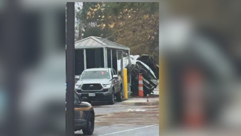 A driver was taken into police custody after their car crashed into the Capital One campus in...