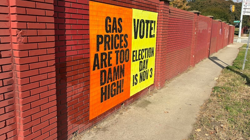 Neon political posters about the cost of living have been glued to buildings in Henrico and...