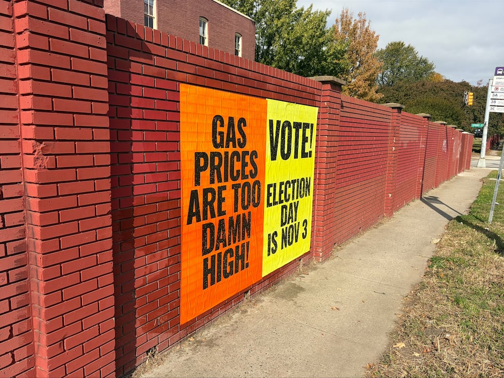 Neon political posters about the cost of living have been glued to buildings in Henrico and...