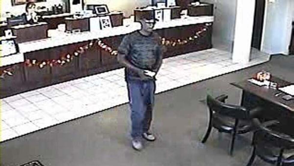 Suspect approached the teller and passed a note demanding money. (Source: Chesterfield Police)