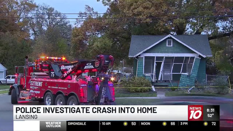 Police are investigating after a car crashed into a home near the intersection of MLK...